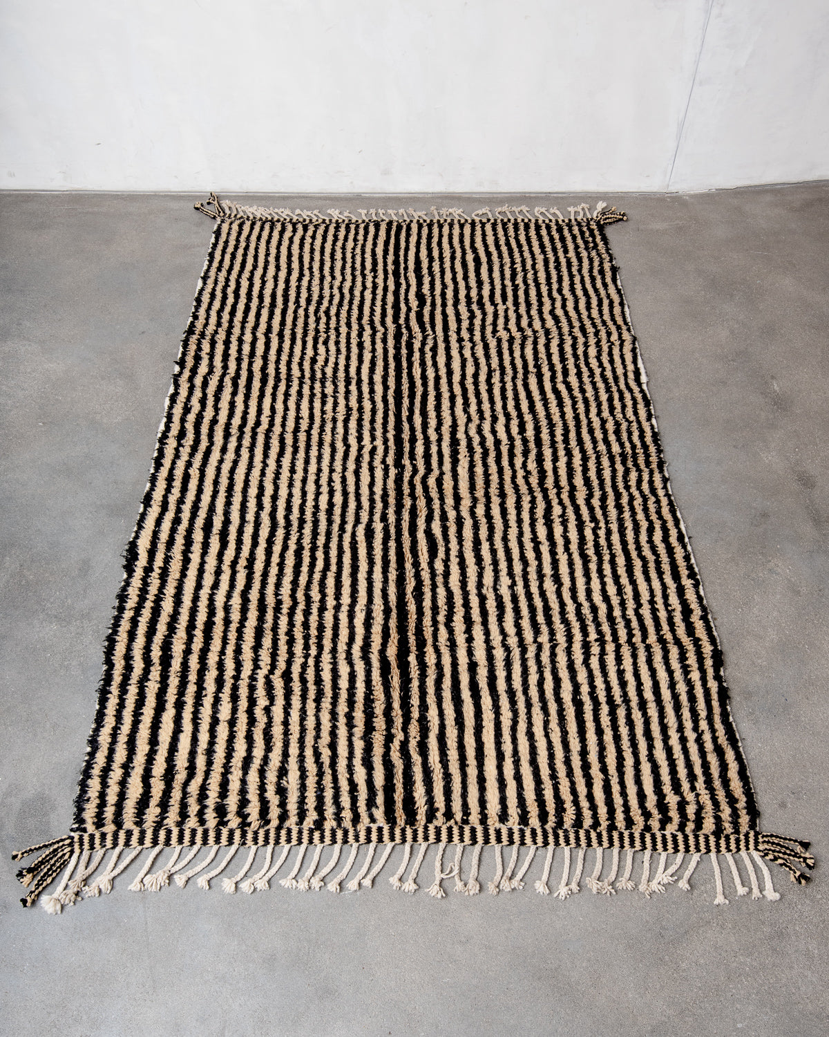Modern, designer, handcrafted Berber rug from Morocco. Beniourain carpet with beautiful colours and patterns and fluffy wool texture.